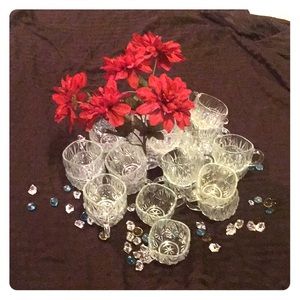 Set of 27 crystal juice cups with handles.